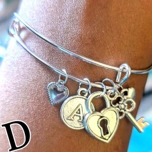 bite & pout "D" Silver Initial Bangle